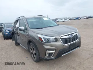 2021 Subaru Forester Touring with VIN JF2SKAXC9MH556986, listed as a IAAI auction lot 41717748 with 33,573 mi miles. Bid and sale history available at carsss.com. Image 1.