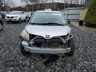 2012 Scion xD with VIN JTKKU4B47C1027093, listed as a Copart auction lot 52070435 with 64,032 mi miles and Clean Title. Bid and sale history available at DreamBid. Image 5.