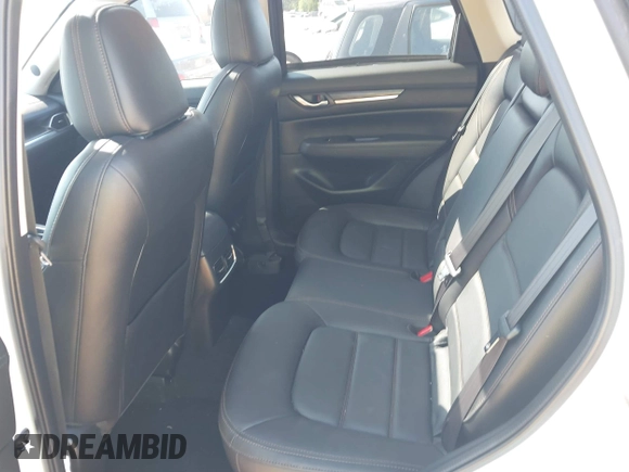 2021 Mazda CX-5 Grand Touring with VIN JM3KFBDM3M0493752, listed as a IAAI auction lot 42456854 with 35,122 mi miles and . Bid and sale history available at DreamBid. Image 8.