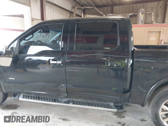 2015 Ford F-150 XL with VIN 1FTEW1CG4FKD77401, listed as a IAAI auction lot 42177021 with 162,825 mi miles. Bid and sale history available at carsss.com. Image 14.
