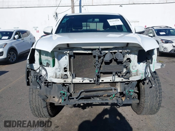 2017 Toyota Tacoma SR5 with VIN 3TMDZ5BN3HM023813, listed as a IAAI auction lot 41522828 with 128,533 mi miles and . Bid and sale history available at DreamBid. Image 13.