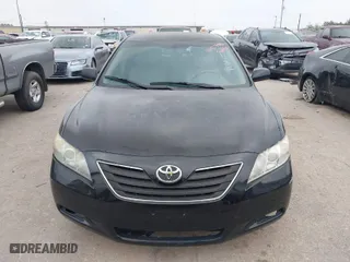 2007 Toyota Camry Hybrid with VIN JTNBB46K873038633, listed as a IAAI auction lot 41927918 with 203,466 mi miles. Bid and sale history available at carsss.com. Image 6.