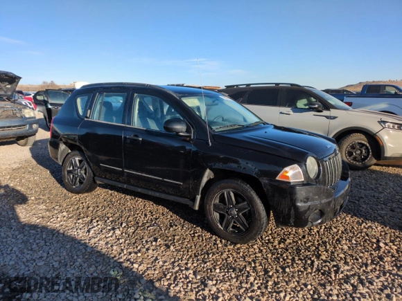 2009 Jeep Compass North with VIN 1J4FT47B89D189562, listed as a Copart auction lot 48285415 with 89,377 mi miles and Salvage Title. Bid and sale history available at carsss.com. Image 4.