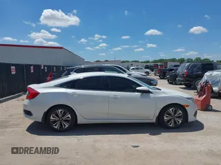 2018 Honda Civic EX-T z VIN JHMFC1F3XJX001723, wystawiony jako IAAI lot #42228776 z przebiegiem 97 432 mil mil oraz . Historia ofert i sprzedaży dostępna na DreamBid. Obrazek 13.