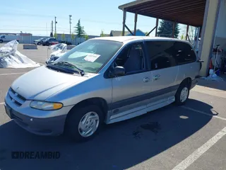 2000 Dodge Caravan SE with VIN 1B4GP44G1YB680819, listed as a IAAI auction lot 42057681 with 23,422 mi miles. Bid and sale history available at carsss.com. Image 16.