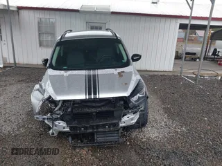 2018 Ford Escape SE z VIN 1FMCU9GD1JUB35184, wystawiony jako IAAI lot #41611285 z przebiegiem 142 267 mil mil oraz . Historia ofert i sprzedaży dostępna na DreamBid. Obrazek 13.
