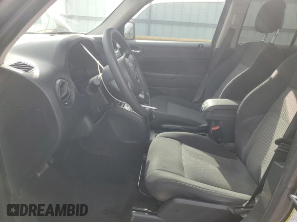 2015 Jeep Patriot Altitude Edition with VIN 1C4NJPBA2FD210652, listed as a Copart auction lot 53297605 with 142,759 mi miles and Salvage Title. Bid and sale history available at carsss.com. Image 7.