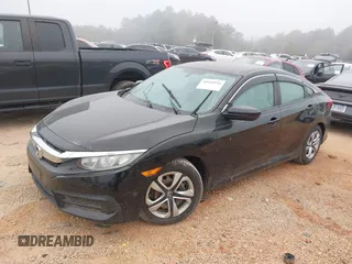 2018 Honda Civic LX with VIN 2HGFC2F55JH595412, listed as a IAAI auction lot 40510936 with 74,359 mi miles and . Bid and sale history available at DreamBid. Image 2.