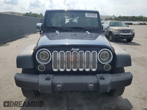 2013 Jeep Wrangler Unlimited Sport z VIN 1C4BJWDG7DL509796, wystawiony jako Copart lot #55787455 z przebiegiem 178 907 mil mil oraz Nie do naprawy • Non repairable. Historia ofert i sprzedaży dostępna na DreamBid. Obrazek 5.