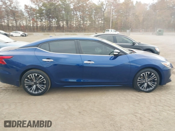 2016 Nissan Maxima Platinum z VIN 1N4AA6AP4GC414364, wystawiony jako IAAI lot #40738491 z przebiegiem 97 889 mil mil oraz . Historia ofert i sprzedaży dostępna na DreamBid. Obrazek 13.