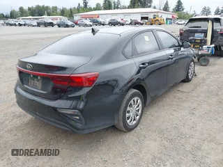 2021 Kia Forte FE with VIN 3KPF24AD6ME320238, listed as a IAAI auction lot 42699035 with 79,058 mi miles and . Bid and sale history available at DreamBid. Image 4.