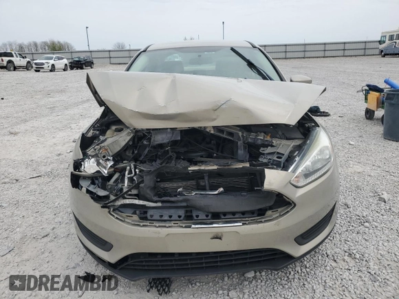 2016 Ford Focus SE z VIN 1FADP3F20GL267077, wystawiony jako Copart lot #53649665 z przebiegiem 106 329 mil mil oraz Szkoda całkowita • Salvage title. Historia ofert i sprzedaży dostępna na DreamBid. Obrazek 5.
