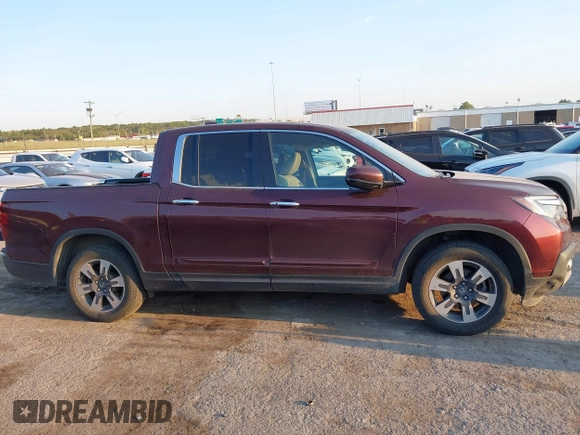 2017 Honda Ridgeline RTL-E with VIN 5FPYK3F74HB029959, listed as a IAAI auction lot 40530840 with 95,596 mi miles and . Bid and sale history available at DreamBid. Image 13.