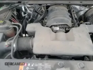 2018 Chevrolet Tahoe LT with VIN 1GNSCBKC1JR184534, listed as a Copart auction lot 87215635 with 145,300 mi miles and Salvage title. Bid and sale history available at DreamBid. Image 14.