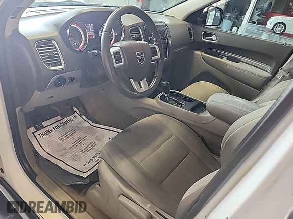2013 Dodge Durango SXT with VIN 1C4RDJAG8DC671689, listed as a IAAI auction lot 42743958 with 160,950 mi miles and . Bid and sale history available at DreamBid. Image 4.