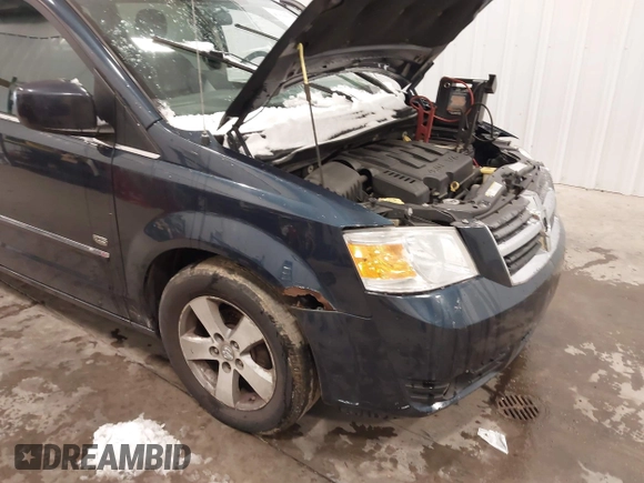 2009 Dodge Grand Caravan SXT z VIN 2D8HN54X89R645251, wystawiony jako IAAI lot #41916035 z przebiegiem 183 678 mil mil oraz . Historia ofert i sprzedaży dostępna na DreamBid. Obrazek 12.