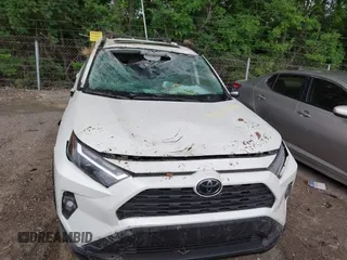 2022 Toyota RAV4 XLE Premium z VIN 2T3A1RFV1NW312419, wystawiony jako IAAI lot #42361686 z przebiegiem 14 291 mil mil oraz . Historia ofert i sprzedaży dostępna na DreamBid. Obrazek 12.