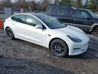 2023 Tesla Model 3 with VIN 5YJ3E1EAXPF543227, listed as a IAAI auction lot 41150158 with 19,782 mi miles and . Bid and sale history available at DreamBid. Image 1.