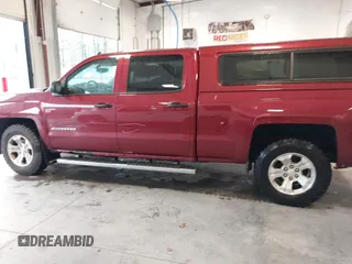 2014 Chevrolet Silverado 1500 LT with VIN 3GCUKREC9EG358476, listed as a IAAI auction lot 41866756 with 210,880 mi miles and . Bid and sale history available at DreamBid. Image 14.
