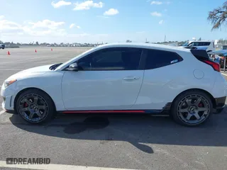 2019 Hyundai Veloster N with VIN KMHT36AH6KU001916, listed as a IAAI auction lot 41577775 with 77,471 mi miles. Bid and sale history available at carsss.com. Image 14.