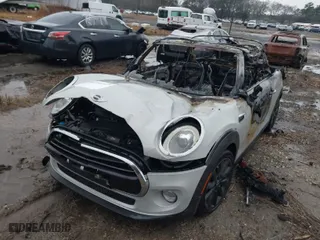 2017 MINI Convertible Cooper with VIN WMWWG5C30H3C20290, listed as a IAAI auction lot 41750397 with 1 mi miles. Bid and sale history available at carsss.com. Image 2.