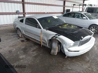 2005 Ford Mustang Deluxe with VIN 1ZVFT80N955114839, listed as a IAAI auction lot 42689801 with 149,556 mi miles and . Bid and sale history available at DreamBid. Image 1.