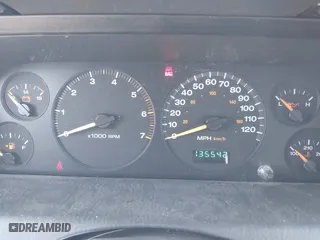 2002 Jeep Grand Cherokee Laredo with VIN 1J4GW48S42C324297, listed as a IAAI auction lot 42050957 with 135,542 mi miles. Bid and sale history available at carsss.com. Image 7.