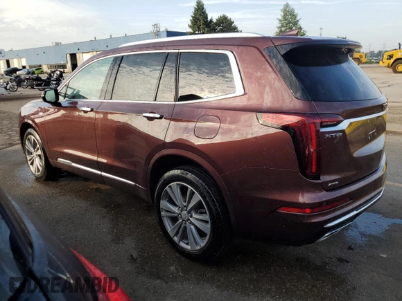 2022 Cadillac XT6 Premium Luxury with VIN 1GYKPDRS7NZ135215, listed as a Copart auction lot 67701694 with 30,498 mi miles and Non Repairable. Bid and sale history available at carsss.com. Image 2.