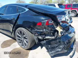 2018 Tesla Model S 75D with VIN 5YJSA1E22JF289195, listed as a IAAI auction lot 41825949 with 49,217 mi miles and . Bid and sale history available at DreamBid. Image 19.