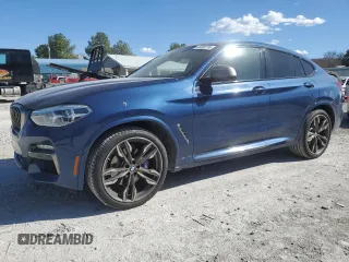 2020 BMW X4 M40i with VIN 5UX2V5C01LLE69394, listed as a Copart auction lot 44036774 with 22,582 mi miles and Clean Title. Bid and sale history available at carsss.com. Image 1.