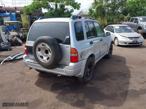 2002 Suzuki Grand Vitara with VIN JS3TE62VX24154173, listed as a IAAI auction lot 41711181 with 224,024 mi miles. Bid and sale history available at carsss.com. Image 4.