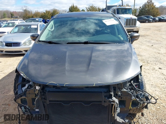 2018 Chrysler Pacifica Touring L with VIN 2C4RC1BG4JR204161, listed as a IAAI auction lot 41737734 with 87,323 mi miles and . Bid and sale history available at DreamBid. Image 13.