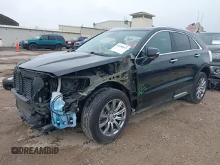 2023 Cadillac XT4 FWD Premium Luxury with VIN 1GYFZCR48PF142752, listed as a IAAI auction lot 42183025 with 45,536 mi miles and . Bid and sale history available at DreamBid. Image 2.
