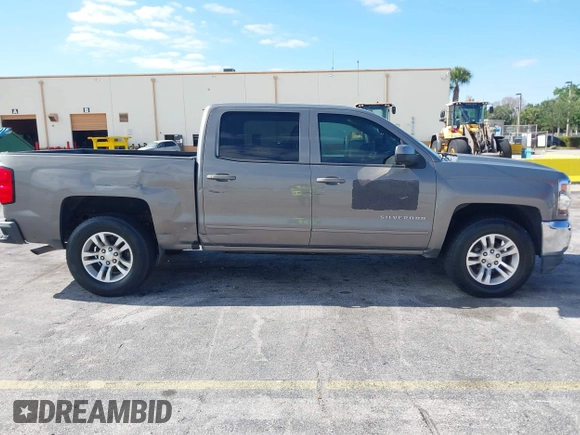 2017 Chevrolet Silverado 1500 LT with VIN 3GCPCREC1HG380406, listed as a IAAI auction lot 42031974 with 128,444 mi miles. Bid and sale history available at carsss.com. Image 6.