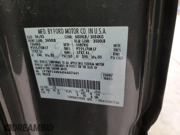 2004 Ford F-150 XL with VIN 1FTRF14W44NA07441, listed as a Copart auction lot 52163935 with 94,640 mi miles and Salvage Title. Bid and sale history available at DreamBid. Image 14.