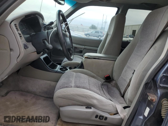 1998 Ford Explorer XLT with VIN 1FMZU32P0WUD21265, listed as a Copart auction lot 73702364 with 211,096 mi miles and Salvage title. Bid and sale history available at DreamBid. Image 7.