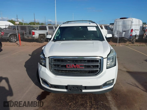 2015 GMC Yukon XL SLT with VIN 1GKS1HKC2FR612690, listed as a IAAI auction lot 41234188 with 113,830 mi miles. Bid and sale history available at carsss.com. Image 12.