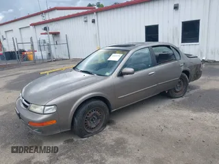 1999 Nissan Maxima GXE z VIN JN1CA21D5XT203484, wystawiony jako IAAI lot #42161696 z przebiegiem 249 747 mil mil oraz . Historia ofert i sprzedaży dostępna na DreamBid. Obrazek 2.