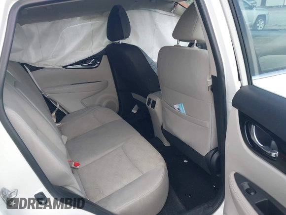 2017 Nissan Rogue SV with VIN JN1BJ1CR3HW100711, listed as a IAAI auction lot 42157090 with 106,067 mi miles and . Bid and sale history available at DreamBid. Image 8.