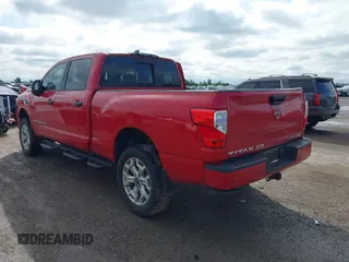 2023 Nissan Titan Pro-4X with VIN 1N6AA1FB9PN104089, listed as a IAAI auction lot 42202488 with 58,151 mi miles and . Bid and sale history available at DreamBid. Image 3.