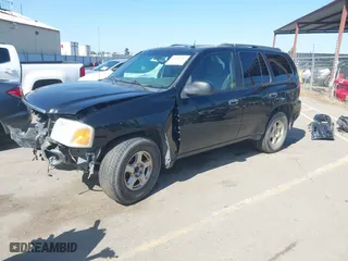 2004 GMC Envoy SLE with VIN 1GKDS13S942294303, listed as a IAAI auction lot 41992547 with 196,444 mi miles. Bid and sale history available at carsss.com. Image 2.