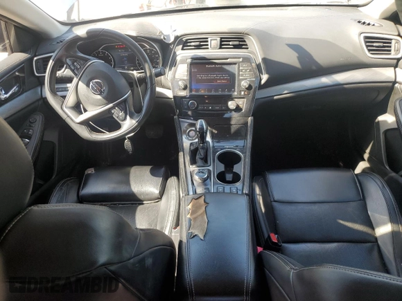 2018 Nissan Maxima SV with VIN 1N4AA6AP0JC389017, listed as a Copart auction lot 57117885 with 169,538 mi miles and Salvage title. Bid and sale history available at DreamBid. Image 8.