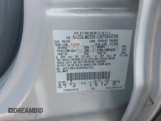 2003 Mazda Tribute LX with VIN 4F2YZ04183KM44733, listed as a IAAI auction lot 41472662 with 246,522 mi miles and . Bid and sale history available at DreamBid. Image 9.