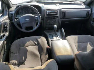 2001 Jeep Grand Cherokee Laredo with VIN 1J4GX48S11C729366, listed as a Copart auction lot 62524565 with 373,749 mi miles and Salvage title. Bid and sale history available at DreamBid. Image 8.