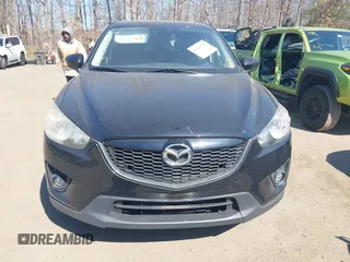 2014 Mazda CX-5 Grand Touring with VIN JM3KE4DY1E0339690, listed as a IAAI auction lot 41668780 with 216,825 mi miles. Bid and sale history available at carsss.com. Image 12.