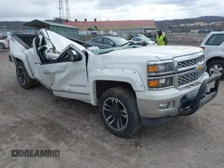 2014 Chevrolet Silverado 1500 LTZ with VIN 1GCVKSEC1EZ209992, listed as a IAAI auction lot 41848951 with 174,111 mi miles and . Bid and sale history available at DreamBid. Image 1.