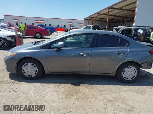 2012 Honda Civic LX z VIN 19XFB2F57CE012290, wystawiony jako IAAI lot #42030870 z przebiegiem 191 886 mil mil oraz . Historia ofert i sprzedaży dostępna na DreamBid. Obrazek 14.