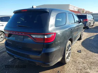 2014 Dodge Durango SXT with VIN 1C4RDHAG8EC353808, listed as a IAAI auction lot 41264850 with 196,716 mi miles and . Bid and sale history available at carsss.com. Image 4.