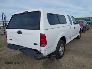 2002 Ford F-150 XL with VIN 1FTRX17222NB82564, listed as a IAAI auction lot 41701719 with 1 mi miles. Bid and sale history available at carsss.com. Image 4.