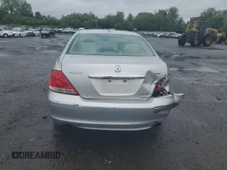 2006 Acura RL z VIN JH4KB16526C005279, wystawiony jako Copart lot #57917835 z przebiegiem 145 737 mil mil oraz Szkody całkowita. Historia ofert i sprzedaży dostępna na DreamBid. Obrazek 6.